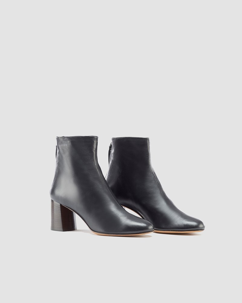 Nadia Soft Heel Boot, 3.1 Phillip Lim is all about sophisticated minimalism and modern designs that showcase the brand’s contemporary and fashionable nature. As seen in these black calf leather Nadia Soft Heel Boots that feature a back zip fastening and a mid high block heel. - 1