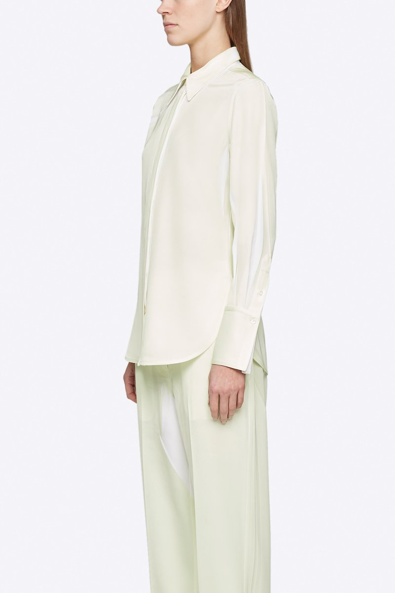 Overprinted Button Down Blouse-white #1 Overprinted Button Down Blouse, There's no bad day a great outfit can't fix. Detailed with a concealed front button placket, this pale yellow and white shirt from 3.1 Phillip Lim will brighten up your wardrobe and your days. Feeling better yet? Featuring a spread collar, long sleeves, button cuffs and a curved hem. POSITIVELY CONSCIOUS: This product is made with a certified eco-material or a recycled material that is better for the planet, so you can be confident you are choosing positively.- 1