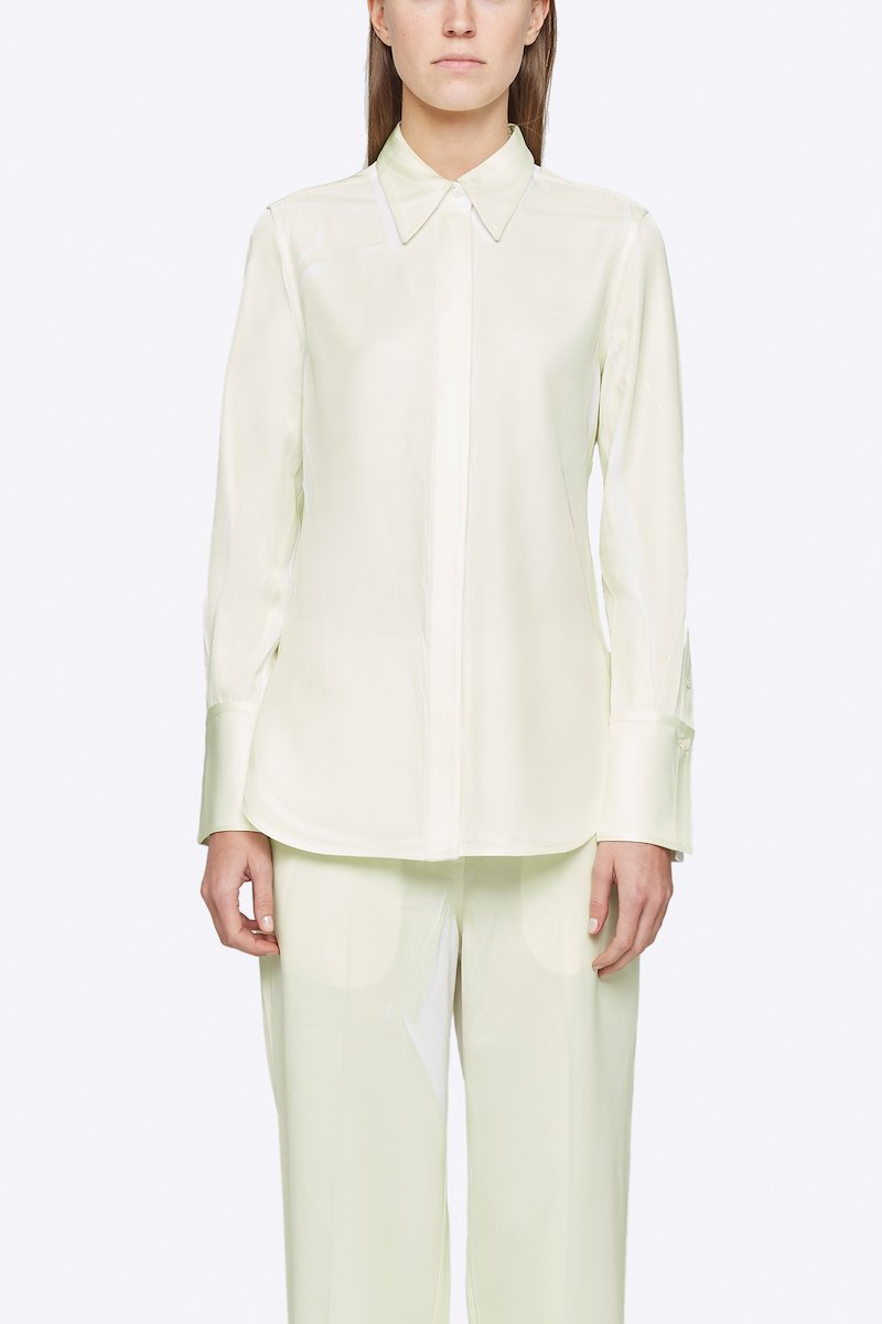 Overprinted Button Down Blouse-white #0 Overprinted Button Down Blouse, There's no bad day a great outfit can't fix. Detailed with a concealed front button placket, this pale yellow and white shirt from 3.1 Phillip Lim will brighten up your wardrobe and your days. Feeling better yet? Featuring a spread collar, long sleeves, button cuffs and a curved hem. POSITIVELY CONSCIOUS: This product is made with a certified eco-material or a recycled material that is better for the planet, so you can be confident you are choosing positively.- 0