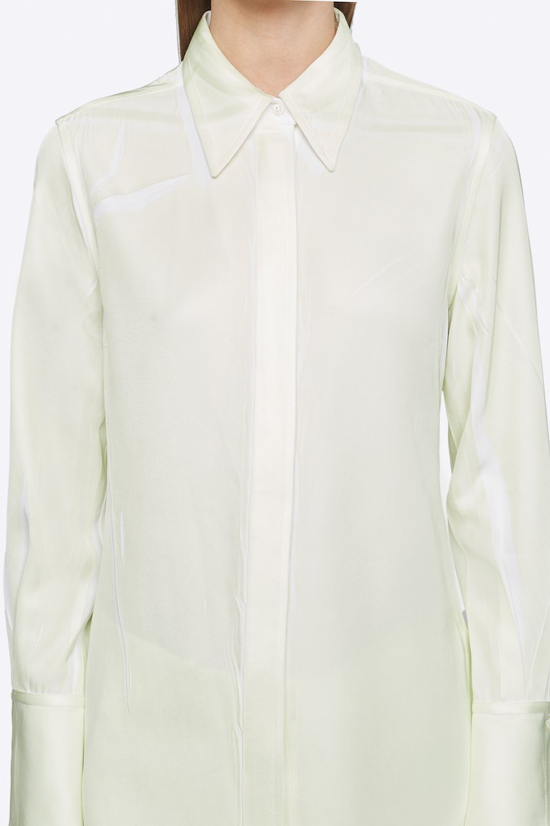 Overprinted Button Down Blouse-white #1 Overprinted Button Down Blouse, There's no bad day a great outfit can't fix. Detailed with a concealed front button placket, this pale yellow and white shirt from 3.1 Phillip Lim will brighten up your wardrobe and your days. Feeling better yet? Featuring a spread collar, long sleeves, button cuffs and a curved hem. POSITIVELY CONSCIOUS: This product is made with a certified eco-material or a recycled material that is better for the planet, so you can be confident you are choosing positively.- 3