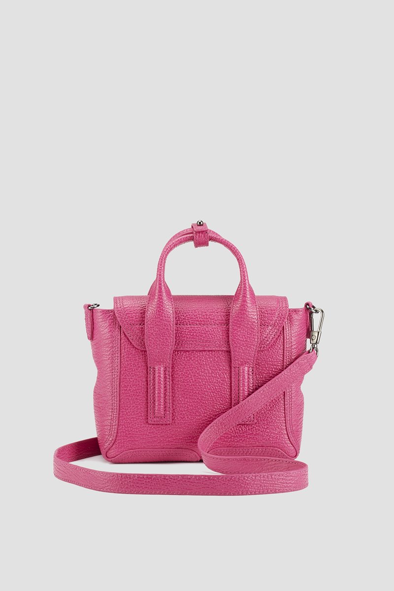 Pashli Mini Satchel-pink #1 Pashli Mini Satchel, Bright fuschia pink calf leather Pashli mini satchel bag from 3.1 Phillip Lim featuring adjustable detachable shoulder strap, two rounded top handles, gold-tone clasp fastening, main compartment, internal zip pocket and zip details.- 1