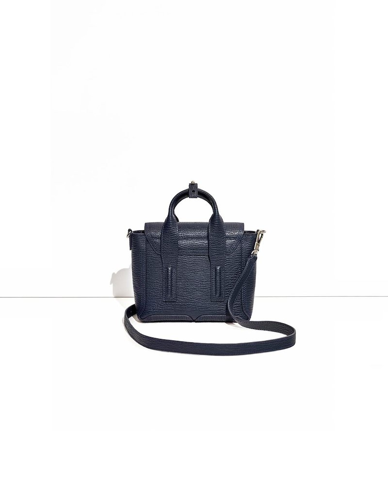 Pashli Mini Satchel-blue #1 Pashli Mini Satchel, Ink blue calf leather Pashli mini satchel bag from 3.1 Phillip Lim featuring adjustable detachable shoulder strap, silver-tone hardware, two rounded top handles, clasp fastening, main compartment, internal zip pocket and zip details.- 1