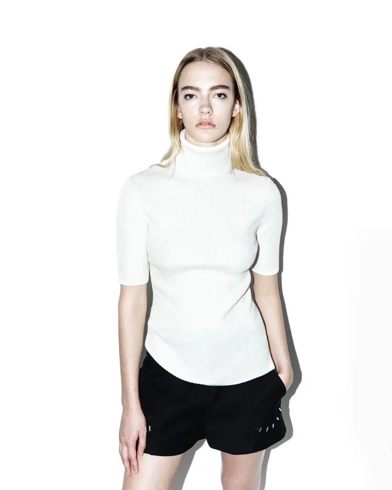 designer white turtleneck