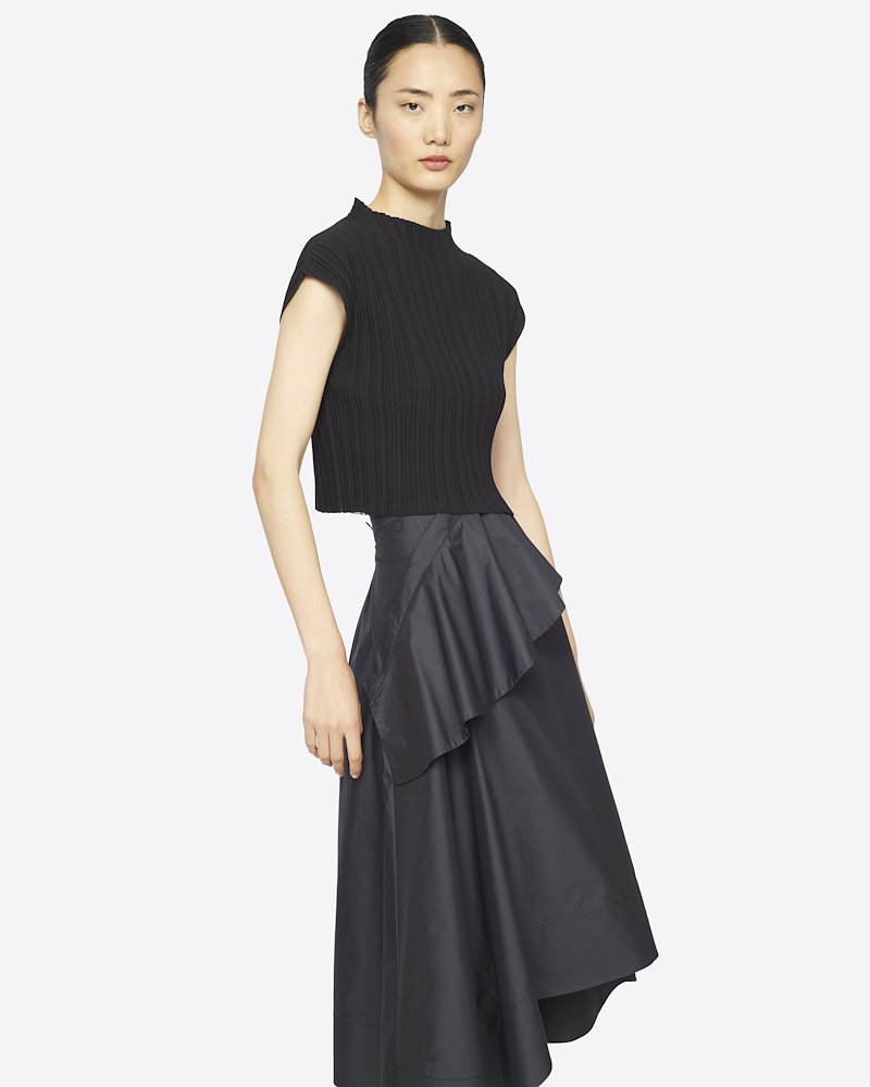 Ruffle Front Skirt-black #1 Ruffle Front Skirt, If you like, put a ruffle on it. 3.1 Phillip Lim makes sure you want to secure this black stretch-cotton midi skirt by adding a ruffle to the front. Show it how you like it. Featuring a ruffle trimming, a high rise, a back zip fastening, an asymmetric hem and a mid-length. - 3