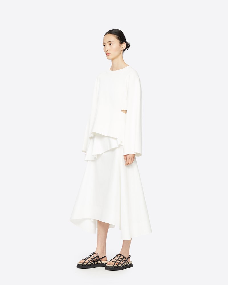 Ruffle Front Skirt-white #1 Ruffle Front Skirt, A piece that makes a great first impression. This ruffled front midi skirt will ruffle your feathers in the best was possible. As per usual, when it comes to 3.1 Phillip Lim. Featuring a ruffled design, a high waist, a mid-length, an asymmetric hem and a concealed rear zip fastening. - 1