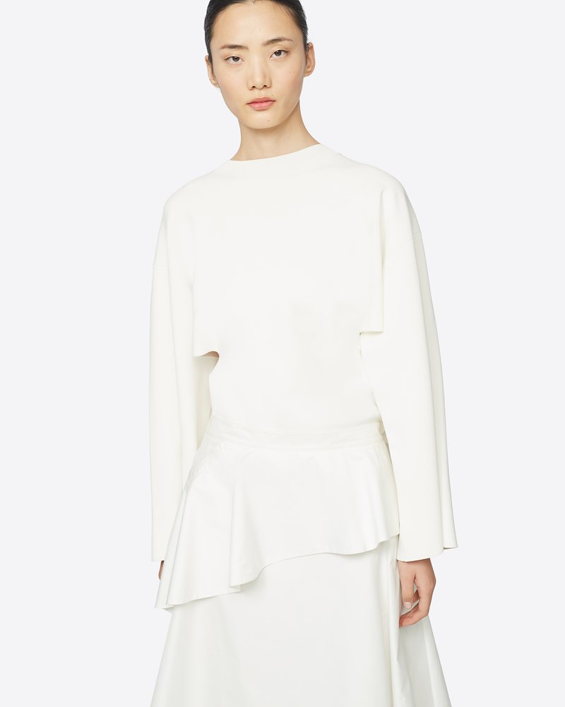 Ruffle Front Skirt-white #1 Ruffle Front Skirt, A piece that makes a great first impression. This ruffled front midi skirt will ruffle your feathers in the best was possible. As per usual, when it comes to 3.1 Phillip Lim. Featuring a ruffled design, a high waist, a mid-length, an asymmetric hem and a concealed rear zip fastening. - 3
