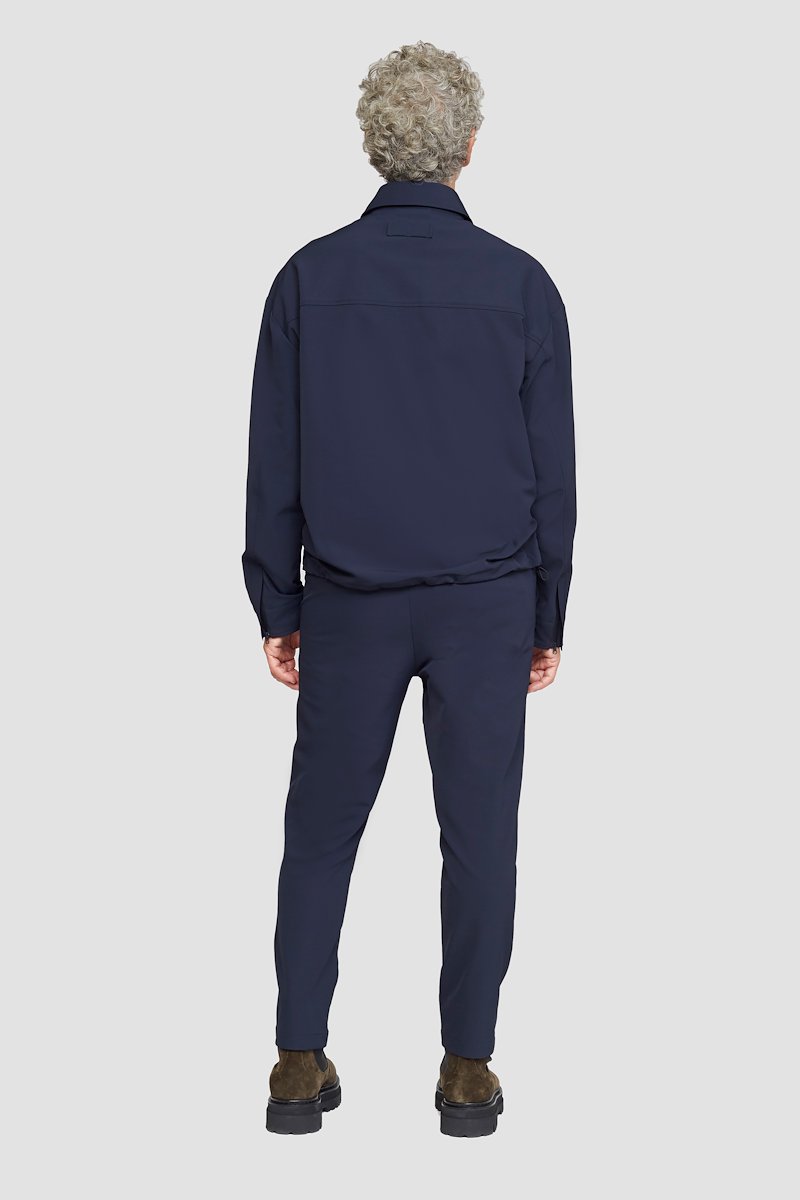 The Coach Jacket-blue #0 The Coach Jacket, Navy blue The Coach shirt jacket from 3.1 PHILLIP LIM featuring straight-point collar, concealed front fastening, long sleeves, two side slit pockets and drawstring hem.- 2