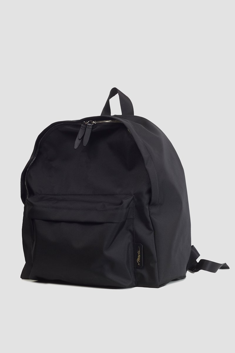 The Deconstructed Backpack-black #1 The Deconstructed Backpack, Black logo-patch Deconstructed backpack from 3.1 PHILLIP LIM featuring logo patch to the front, top zip fastening, two padded adjustable shoulder straps, single rounded top handle and front zip-fastening compartment.- 1