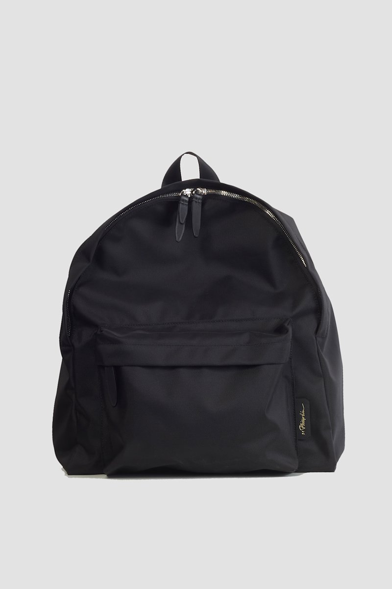 The Deconstructed Backpack-black #0 The Deconstructed Backpack, Black logo-patch Deconstructed backpack from 3.1 PHILLIP LIM featuring logo patch to the front, top zip fastening, two padded adjustable shoulder straps, single rounded top handle and front zip-fastening compartment.- 0