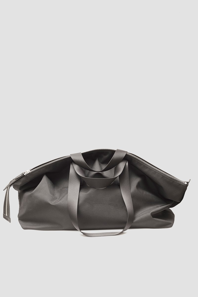 The Deconstructed Duffle Bag-black #0 The Deconstructed Duffle Bag, Black Deconstructed duffle bag from 3.1 PHILLIP LIM featuring leather trim, two top handles, two long top handles and top zip fastening.- 0