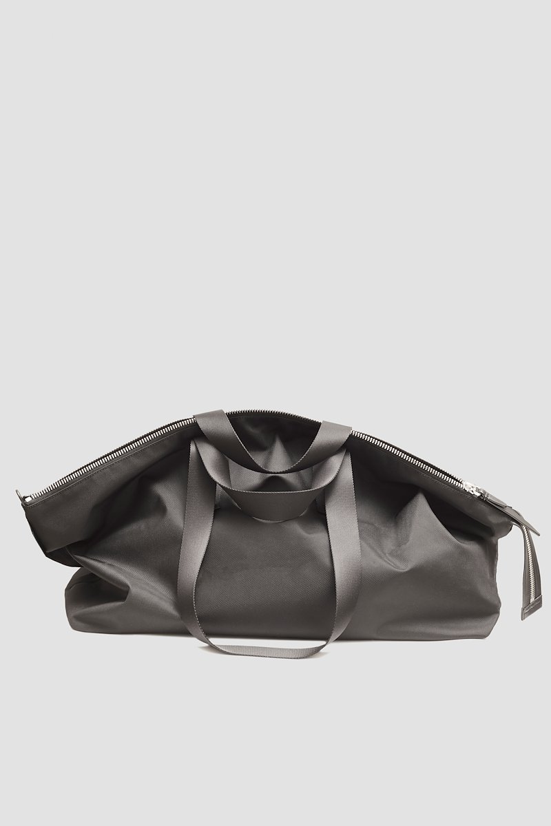 The Deconstructed Duffle Bag-black #1 The Deconstructed Duffle Bag, Black Deconstructed duffle bag from 3.1 PHILLIP LIM featuring leather trim, two top handles, two long top handles and top zip fastening.- 1