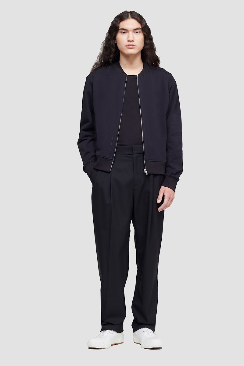 The Everyday Bomber-black #0 The Everyday Bomber, Black cotton zipped-up bomber jacket from 3.1 PHILLIP LIM featuring ribbed detailing, logo patch to the front, band collar, front zip fastening, long sleeves and two side welt pockets.- 0