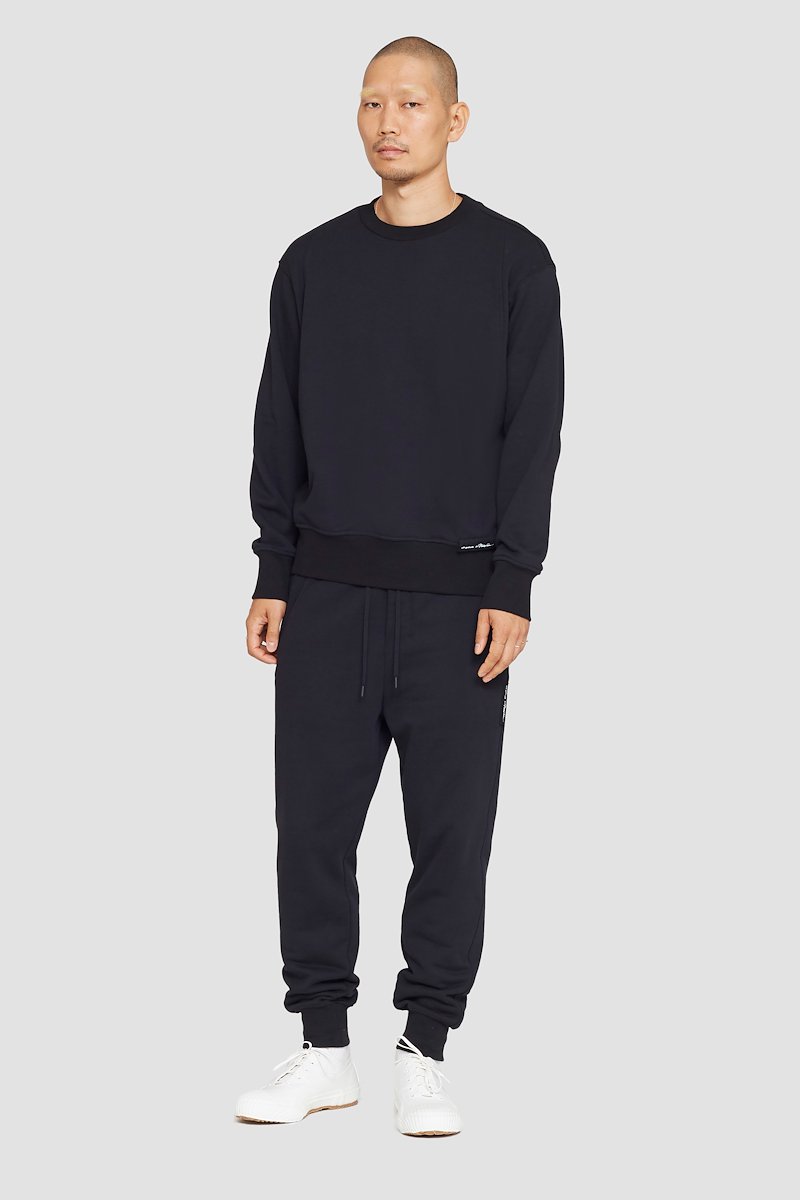 The Everyday Crew Sweatshirt-black #0 The Everyday Crew Sweatshirt, True black cotton Everyday sweatshirt from 3.1 PHILLIP LIM featuring ribbed detailing, logo patch to the front, crew neck, long sleeves, elasticated cuffs and straight hem.- 0