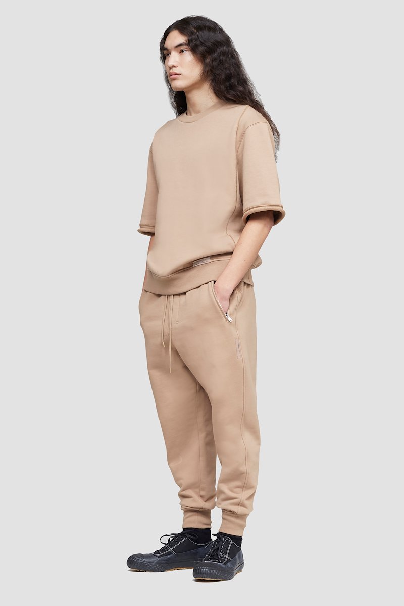 The Everyday Short Sleeve Crew Sweatshirt-neutrals #0 The Everyday Short Sleeve Crew Sweatshirt, Camel brown cotton logo patch detail T-shirt from 3.1 PHILLIP LIM featuring logo patch to the front, ribbed detailing, rolled cuffs, crew neck, short sleeves and straight hem.- 2