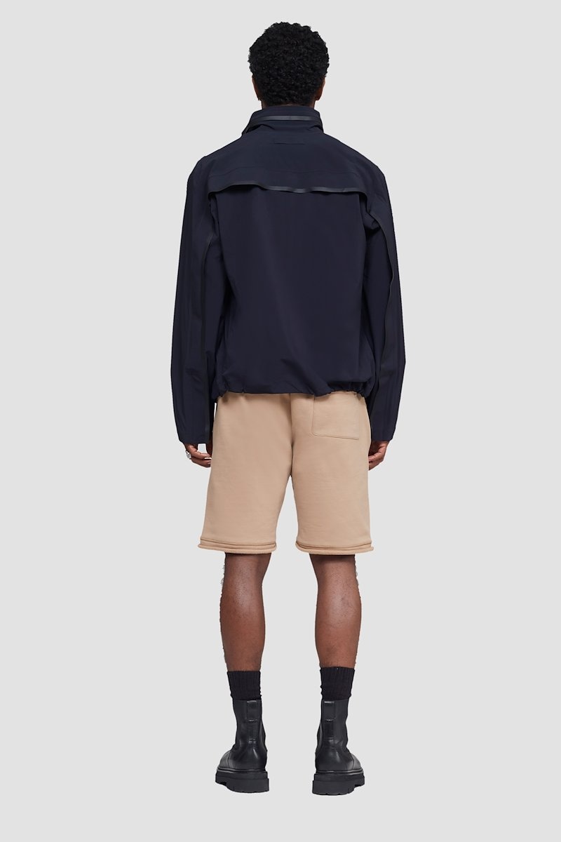 The Everyday Short, Camel-tone knee-length track shorts from 3.1 PHILLIP LIM featuring elasticated drawstring waistband, two side zip-fastening pockets, rear patch pocket, straight leg, logo patch to the side and knee-length.- 3