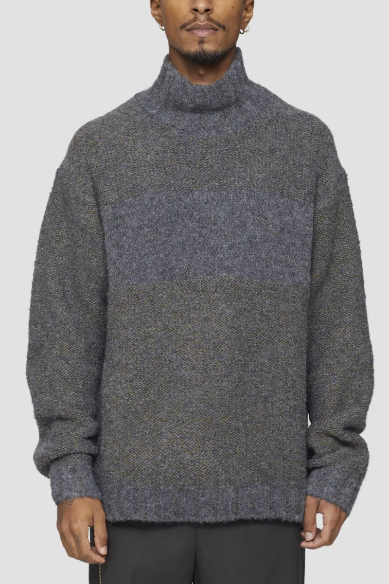 turtleneck sweater designer