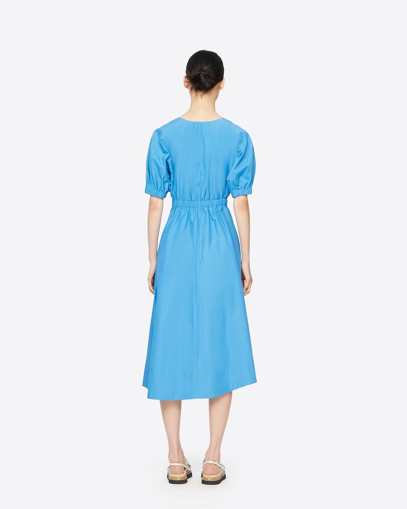 Utility Belted Dress with Gathered Sleeves-blue #0 Utility Belted Dress with Gathered Sleeves, There's nothing you love more than matching things. Matching your pen with your notebook, your headphones with your (reusable) bottle and matching your dress with that blue sky. Opt for this Utility belted midi dress from 3.1 Phillip Lim. Featuring a v-neck, an asymmetric hem, a mid-length, a flared style, short puffed sleeves, tie waist belt and silver-tone snap-button details.- 2
