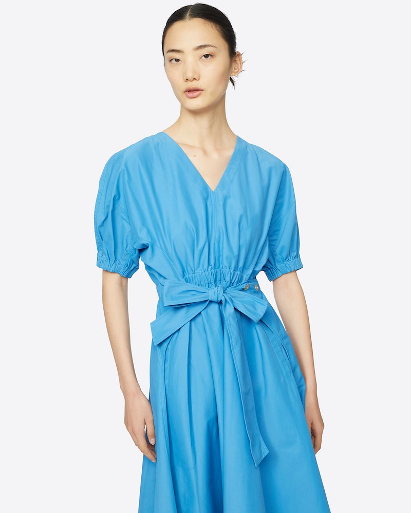 Utility Belted Dress with Gathered Sleeves-blue #1 Utility Belted Dress with Gathered Sleeves, There's nothing you love more than matching things. Matching your pen with your notebook, your headphones with your (reusable) bottle and matching your dress with that blue sky. Opt for this Utility belted midi dress from 3.1 Phillip Lim. Featuring a v-neck, an asymmetric hem, a mid-length, a flared style, short puffed sleeves, tie waist belt and silver-tone snap-button details.- 3