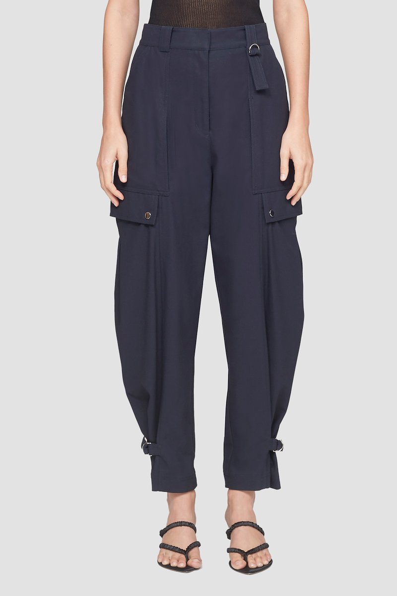 Utility Cargo Pant-blue #1 Utility Cargo Pant, Black cotton tapered-leg trousers from 3.1 PHILLIP LIM featuring D-ring buckle fastening, belt loops, two side flap pockets, ankle-length and buckle-strap at the ankle.- 1
