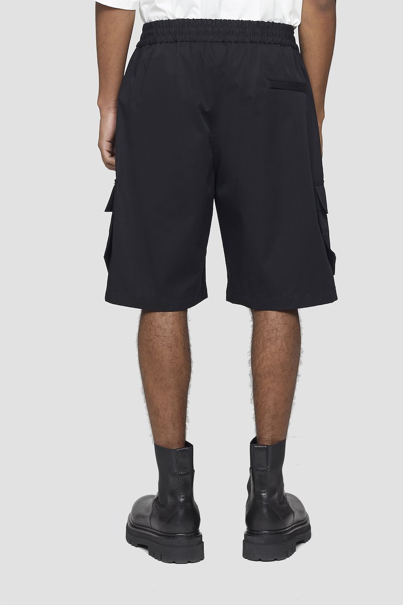 Utility Cargo Shorts-black #0 Utility Cargo Shorts, You've always had a practical approach to style. With multiple pockets, these utility cargo shorts from 3.1 Phillip Lim are functional and fashionable. The best of both worlds. Featuring a button fastening, flap pockets and a knee length. - 2