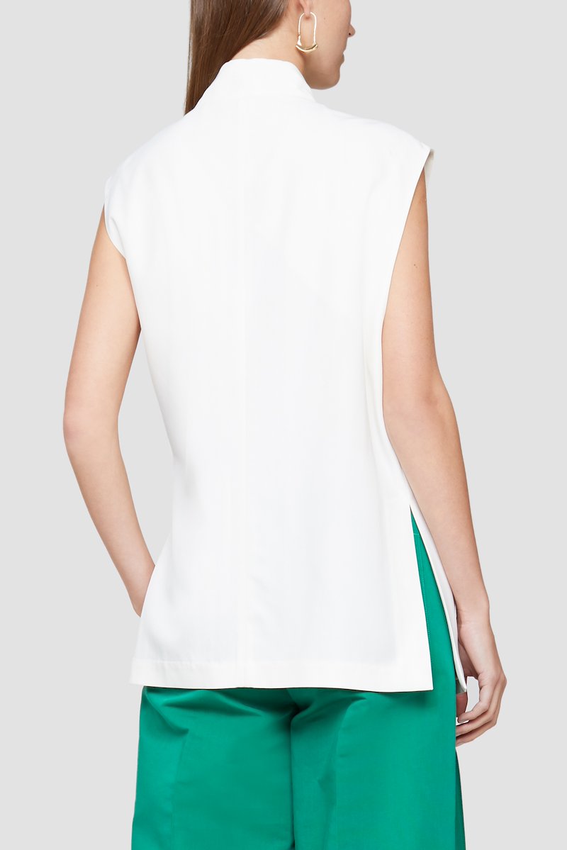 Vest With Tie-white #1 Vest With Tie, You're under a vest! Or you will be after you've made the - very wise - decision of making this ivory-white wraparound vest yours. In the end, 3.1 Phillip Lim will set you free. Featuring a wrap-around silhouette, notched lapels, a side tie fastening, a sleeveless design, a front flap pocket and a straight hem.- 3