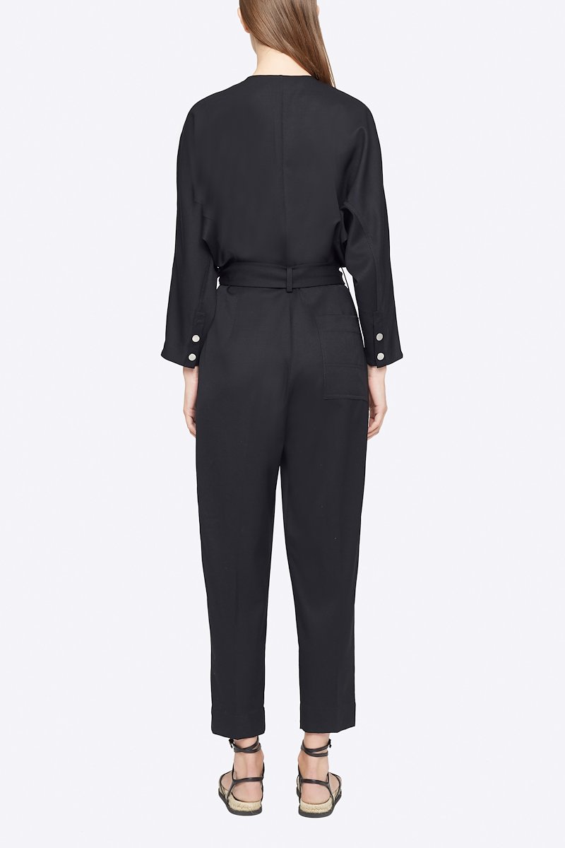 Wool Belted Jumpsuit-black #0 Wool Belted Jumpsuit, Black wool tie-waist wool jumpsuit from 3.1 PHILLIP LIM featuring V-neck, three-quarter length sleeves, buttoned cuffs, tied waist, concealed front button fastening, two side slit pockets, pleat detailing and tapered leg.- 2