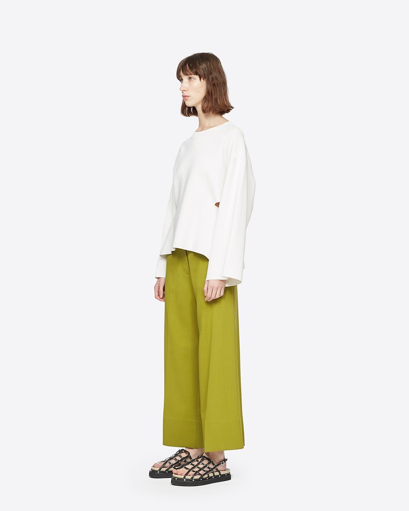 Wool Crepe A-Line Pant-green #1 Wool Crepe A-Line Pant, Praise be to casual office attire. No one wants to sit at a desk all day in uncomfortable formalwear and the same goes for anywhere else, these olive green cropped wide-leg trousers from 3.1 Phillip Lim are the perfect alternative. You'll have everyone green with envy. Featuring a concealed fastening, side pockets, a back pocket, a wide leg and a cropped length. - 1
