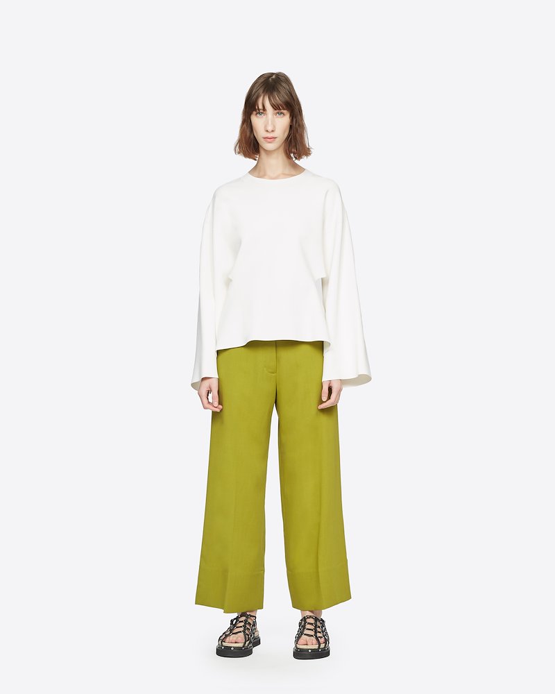 Wool Crepe A-Line Pant-green #0 Wool Crepe A-Line Pant, Praise be to casual office attire. No one wants to sit at a desk all day in uncomfortable formalwear and the same goes for anywhere else, these olive green cropped wide-leg trousers from 3.1 Phillip Lim are the perfect alternative. You'll have everyone green with envy. Featuring a concealed fastening, side pockets, a back pocket, a wide leg and a cropped length. - 0