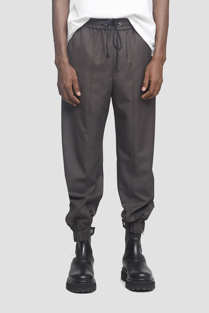 Wool Serge Jogger-grey #0 Wool Serge Jogger, Earth grey Serge wool-blend jogger from 3.1 PHILLIP LIM featuring exposed-seam detailing, elasticated waistband, elasticated cuffs, buttoned cuffs, two side slit pockets and rear welt pocket.- 0