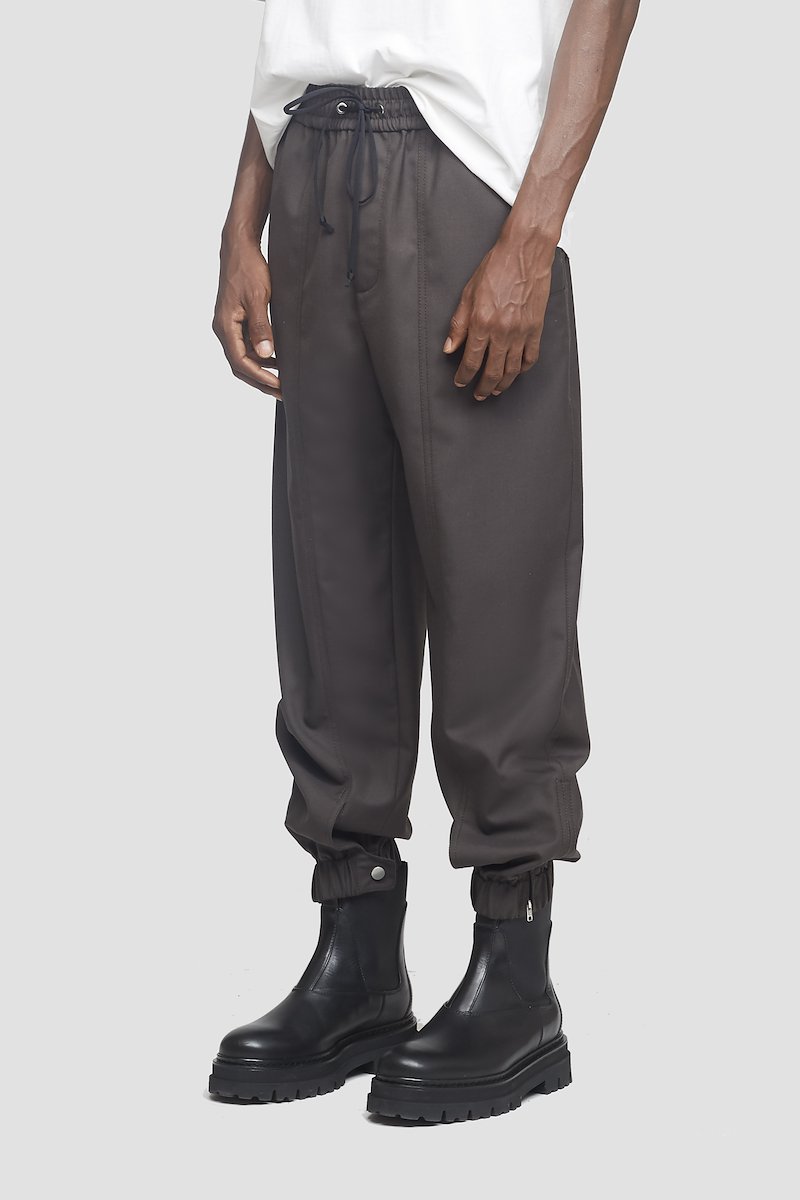 Wool Serge Jogger-grey #1 Wool Serge Jogger, Earth grey Serge wool-blend jogger from 3.1 PHILLIP LIM featuring exposed-seam detailing, elasticated waistband, elasticated cuffs, buttoned cuffs, two side slit pockets and rear welt pocket.- 1