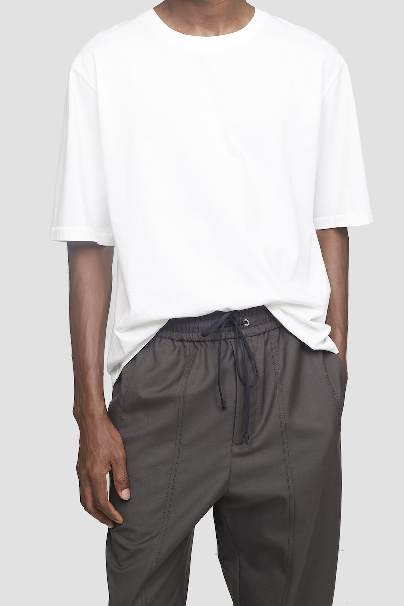 Wool Serge Jogger-grey #1 Wool Serge Jogger, Earth grey Serge wool-blend jogger from 3.1 PHILLIP LIM featuring exposed-seam detailing, elasticated waistband, elasticated cuffs, buttoned cuffs, two side slit pockets and rear welt pocket.- 3
