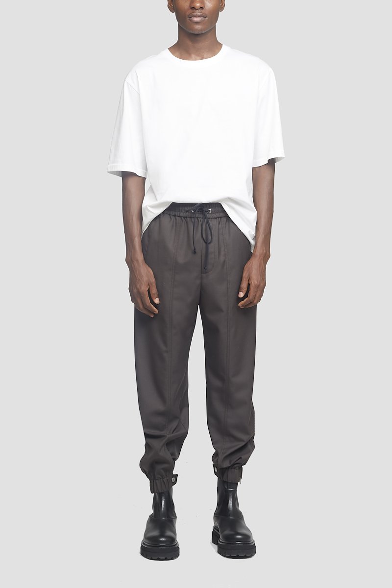 Wool Serge Jogger-grey #0 Wool Serge Jogger, Earth grey Serge wool-blend jogger from 3.1 PHILLIP LIM featuring exposed-seam detailing, elasticated waistband, elasticated cuffs, buttoned cuffs, two side slit pockets and rear welt pocket.- 4