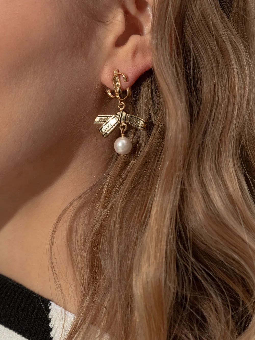 Jimmy Choo ribbon earrings - Goud