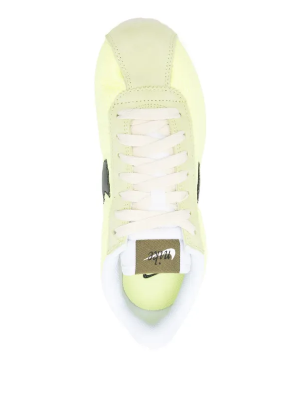 yellow and white cortez