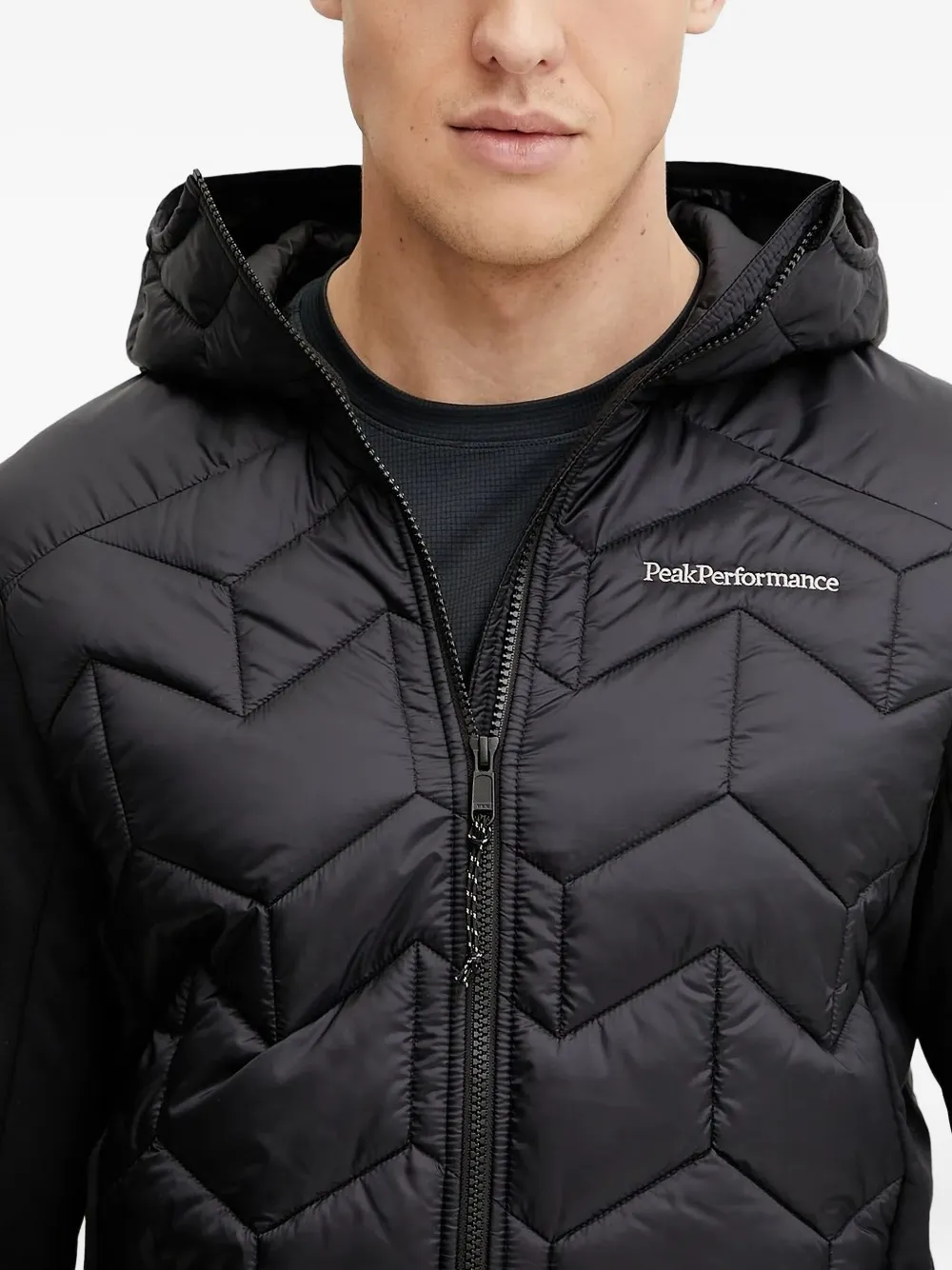 Peak Performance quilted hooded jacket Zwart