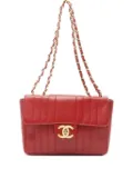 CHANEL Pre-Owned 1990s Mademoiselle-quilted shoulder bag - Red