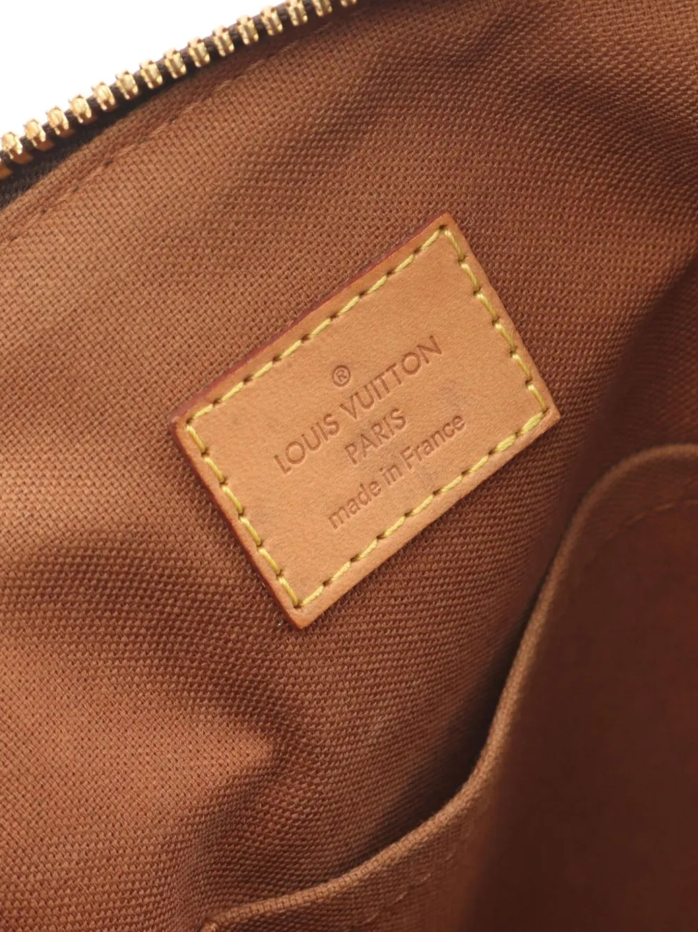 Pre-owned Louis Vuitton 2010 Tivoli Gm Tote Bag In Brown