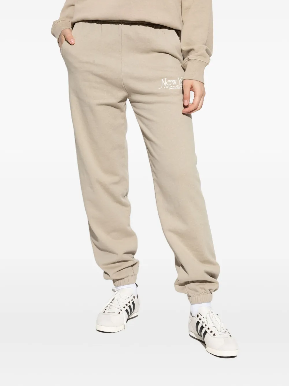 Sporty & Rich slogan-print track pants - Beige