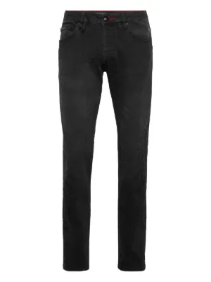AMIRI Distressed Skinny Jeans | Black | FARFETCH