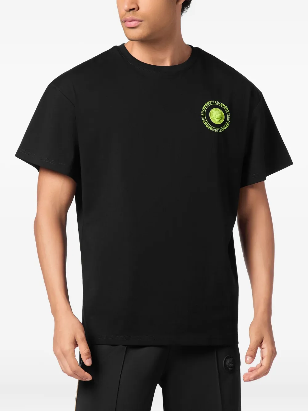 Plein Sport T-shirt met rond plakkaat en logo op de achterkant - Zwart