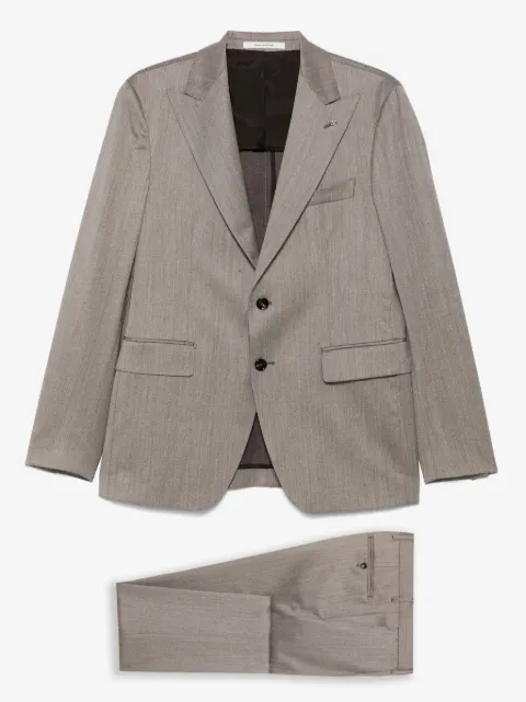 Tagliatore traje con botones