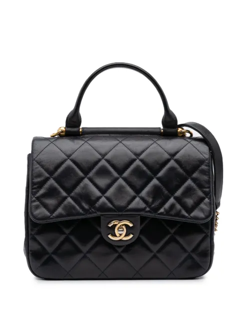 CHANEL Pre-Owned bolsa satchel Flap mediana de piel de becerro capitonada y glaseada con barra dorada 2016-2017