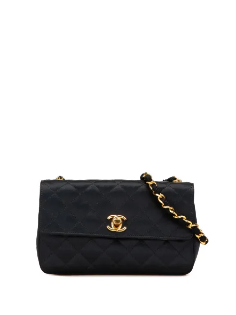 CHANEL Pre-Owned bolsa crossbody Flap mini de satén capitonado con logo CC 1986-1988