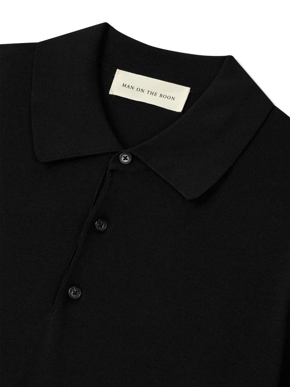 Man On The Boon. Gebreid poloshirt Zwart