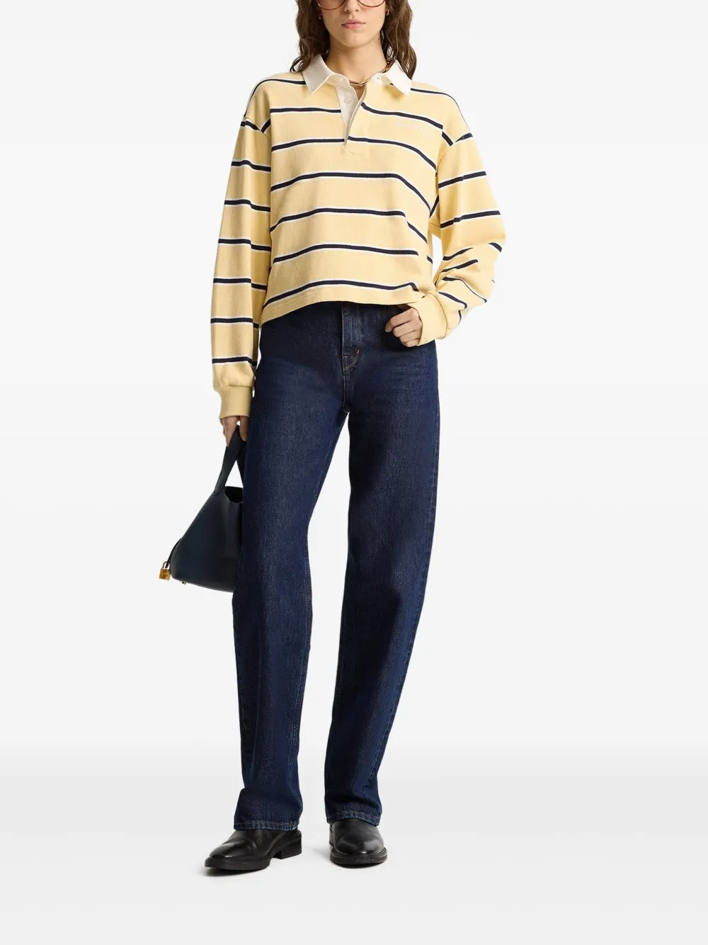 Sporty & Rich Poloshirt met Serif-logo Geel