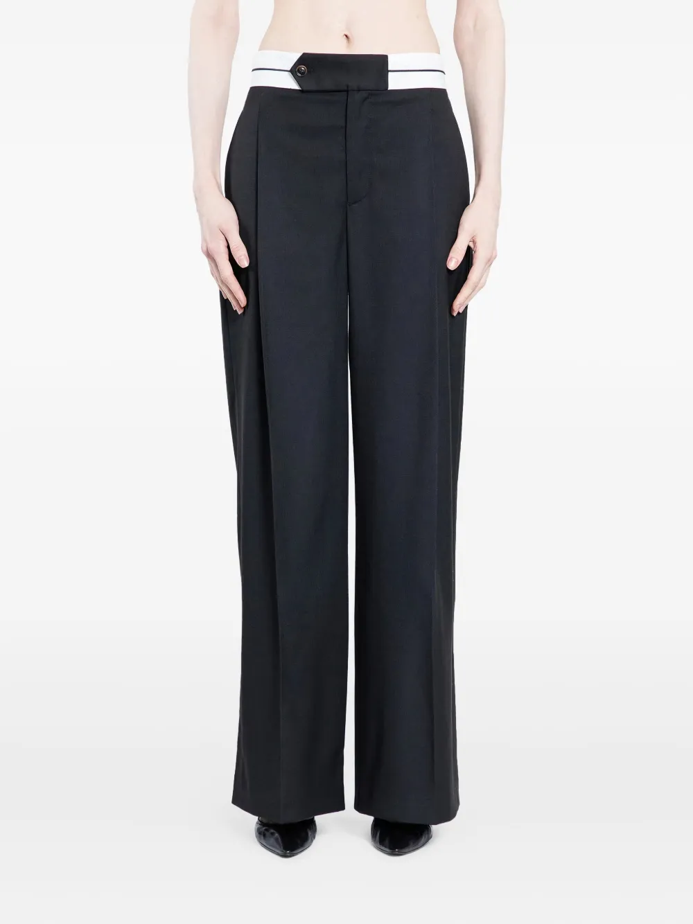 The Garment Pluto pleated trousers