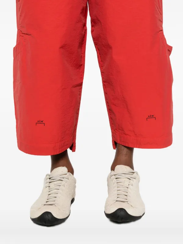 A-COLD-WALL* ネットポケット付きフィッシングパンツ A-COLD-WALL* ポケット パンツ | レッド | FARFETCH JP