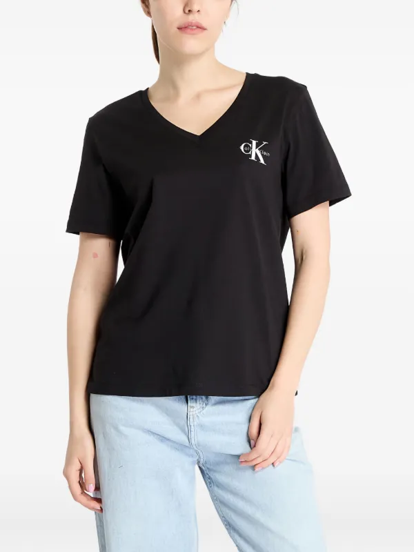 トップス   Jeans / CKJ LOGO PRINT Calvin Klein Jeans Logo v-neck Tee | White | FARFETCH ZA