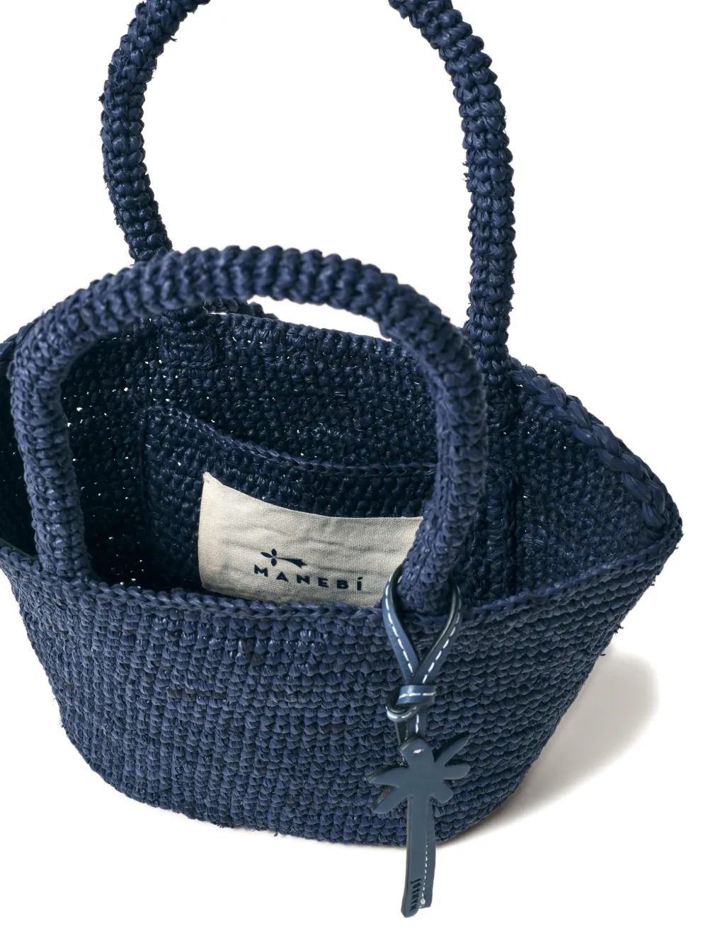 Manebi Sunset kleine raffia tas met handgreep Blauw