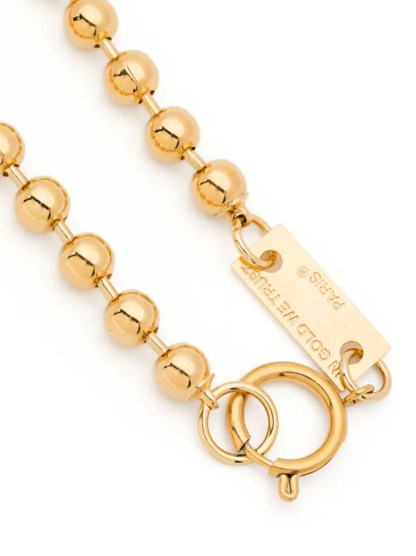 IN GOLD WE TRUST PARIS Sacred Tooth ネックレス | ゴールドトーン 